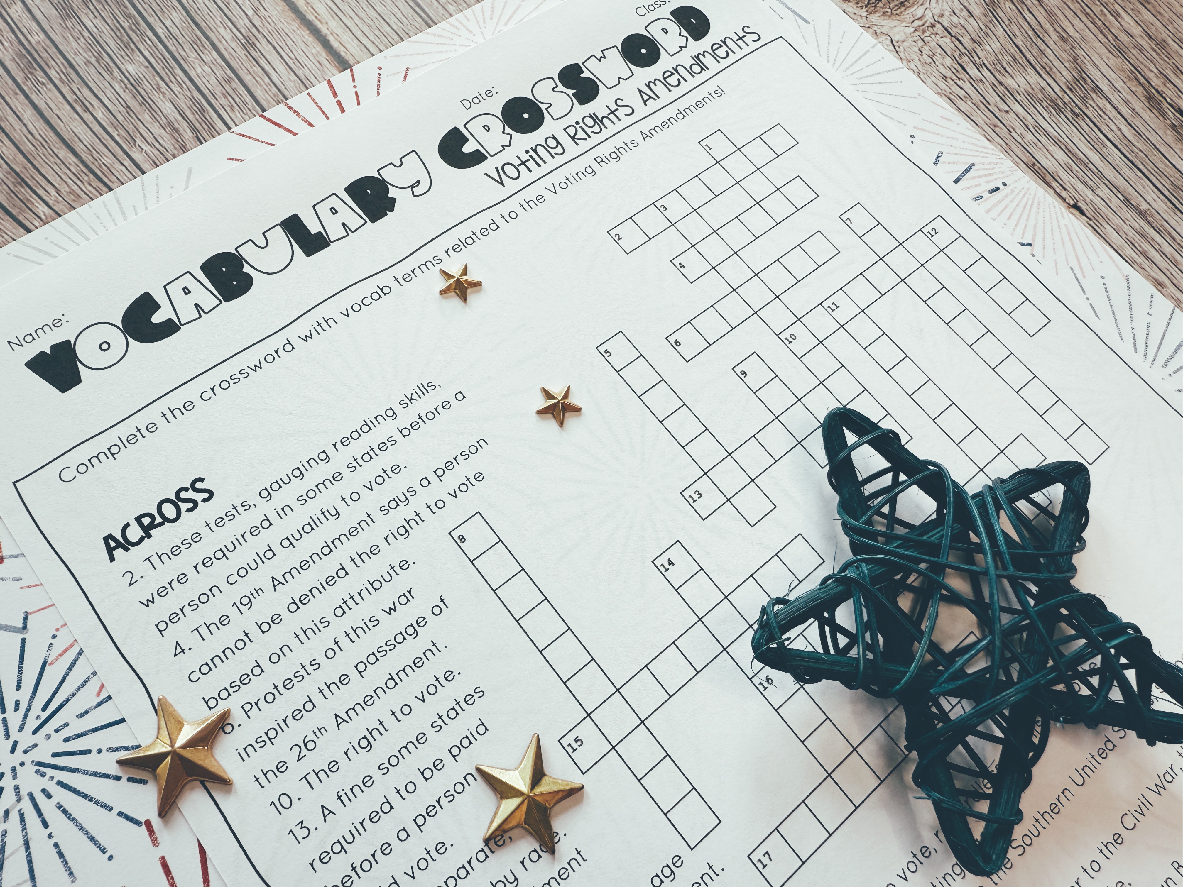 A crossword puzzle is displayed on a tabletop.